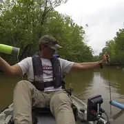 Fisherman pulling a line out of the water