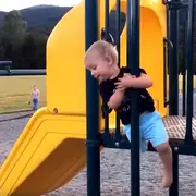 Kid falling off playground