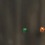 Two paintballs about to collide 