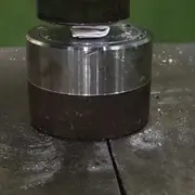 Paper in hydraulic press