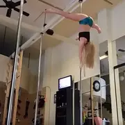 Woman pole dancing