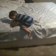 Toddler on a bed